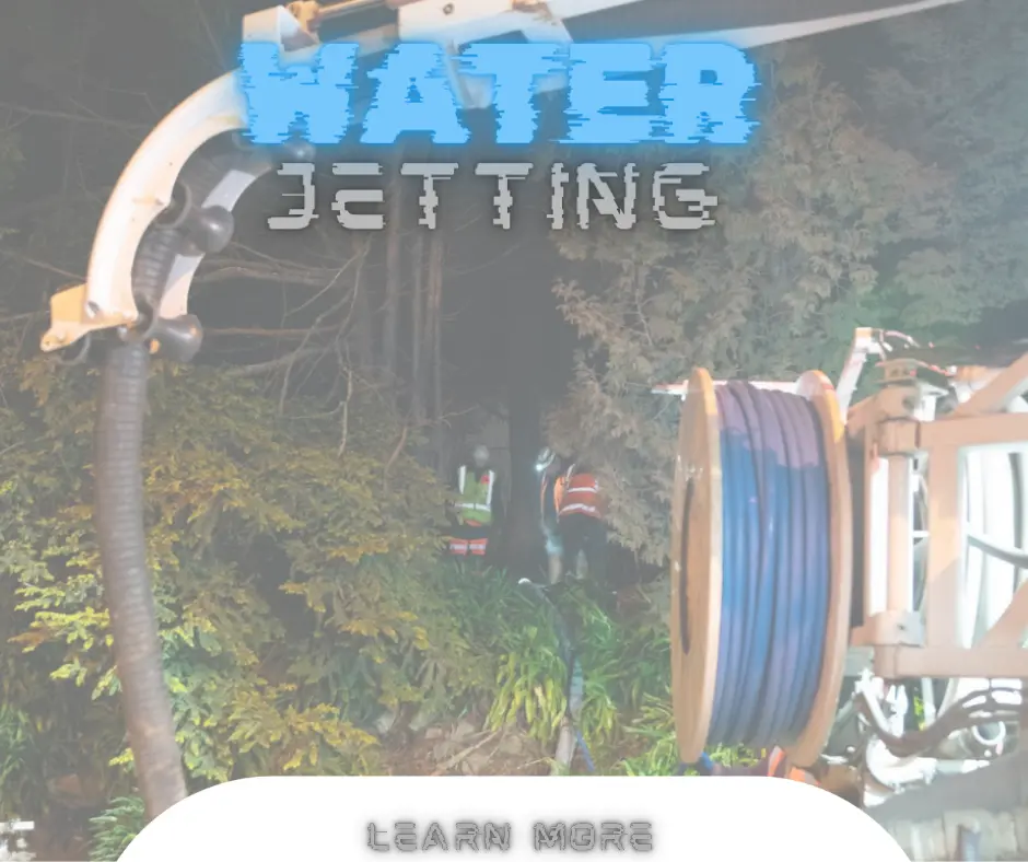 High-pressure water jetting to clear blocked drain in Hamilton
